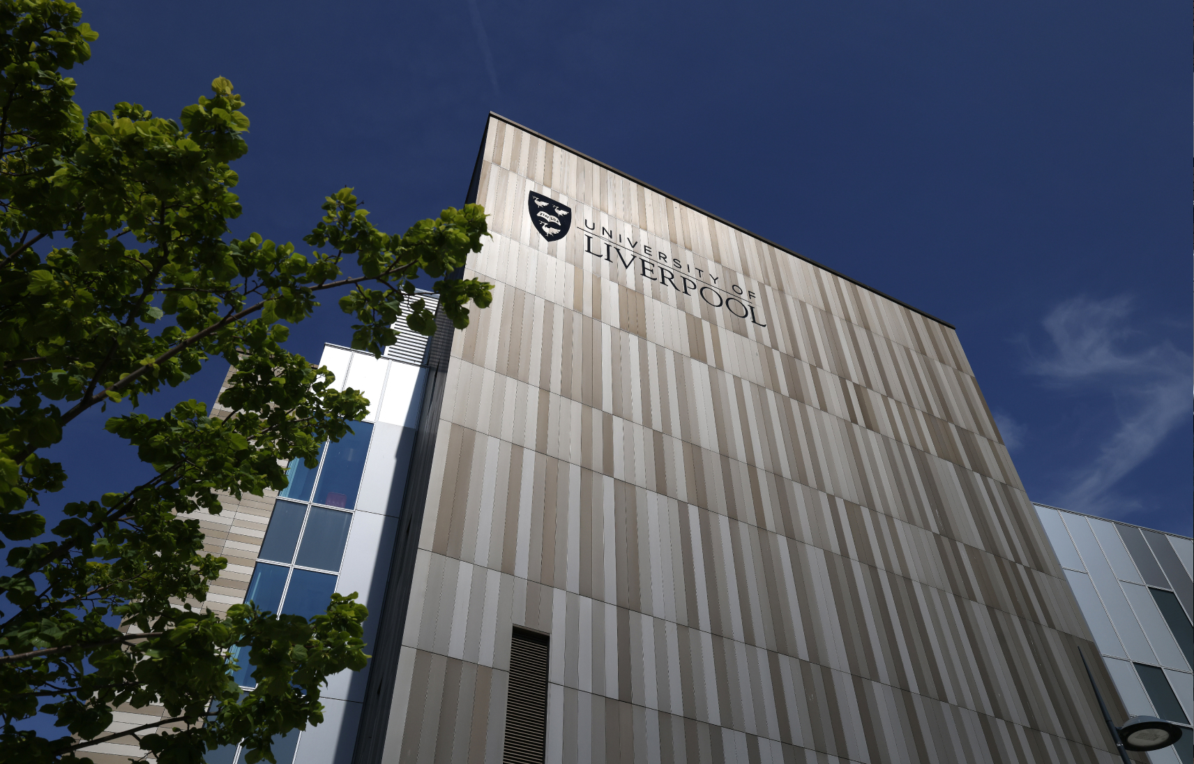 Street view of the University of Liverpool campus showing a modern facade
